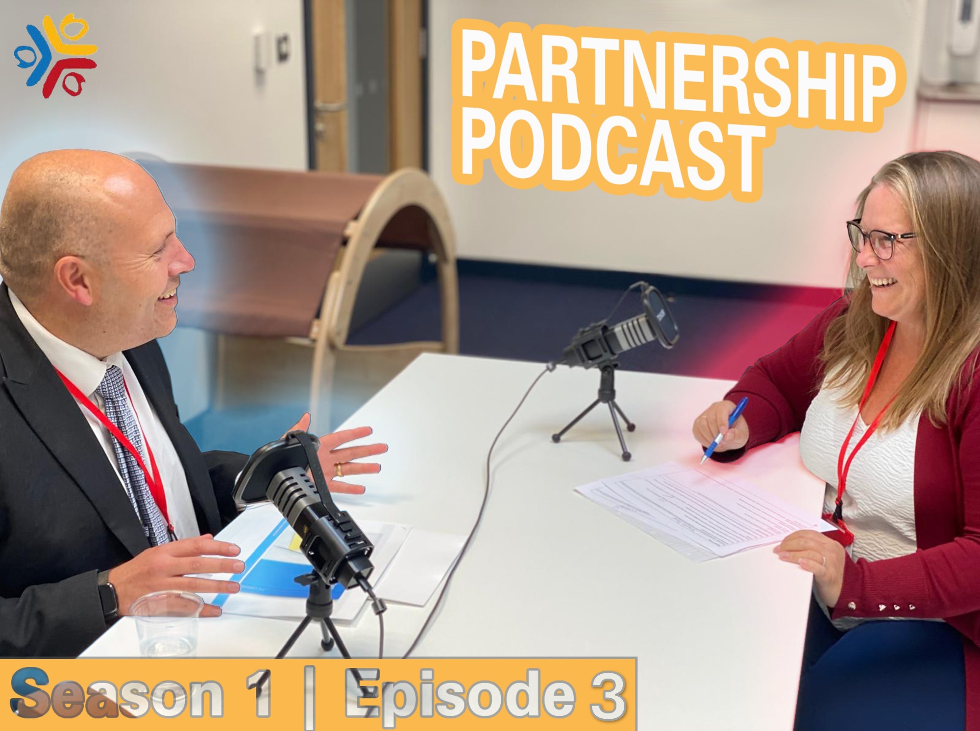 The Partnership Podcast Episode 3 - Sam and Jenn sitting at a table